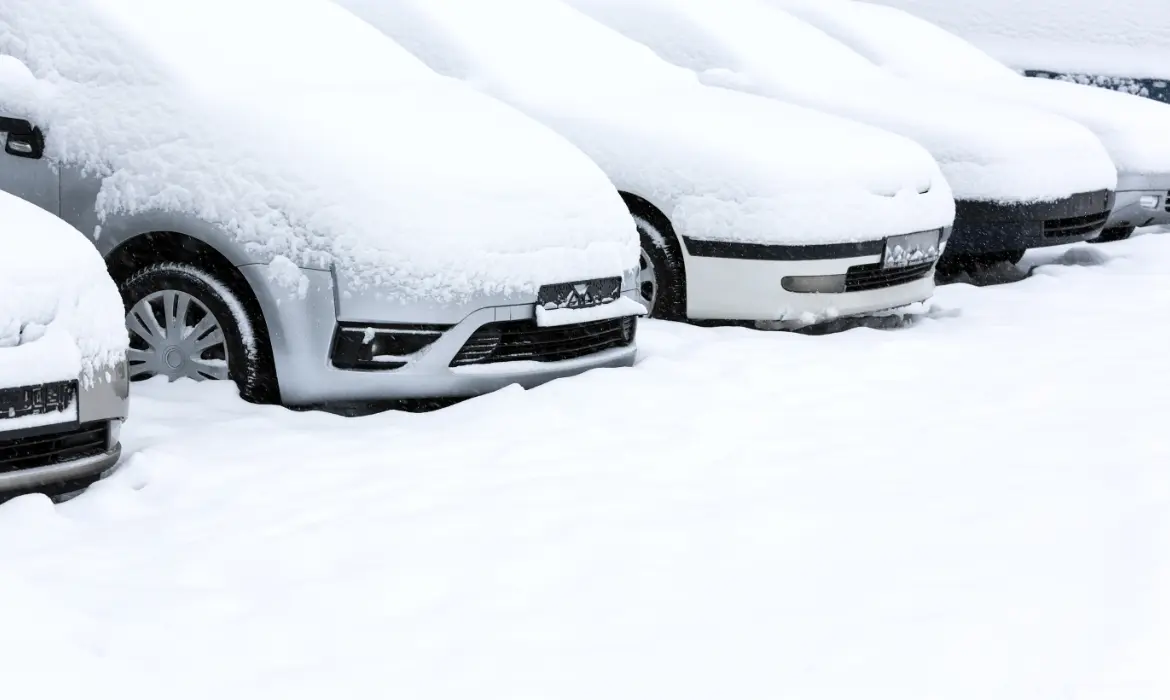 Cars in a snowy parking lot