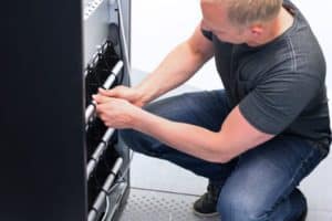 Man maintaining a battery